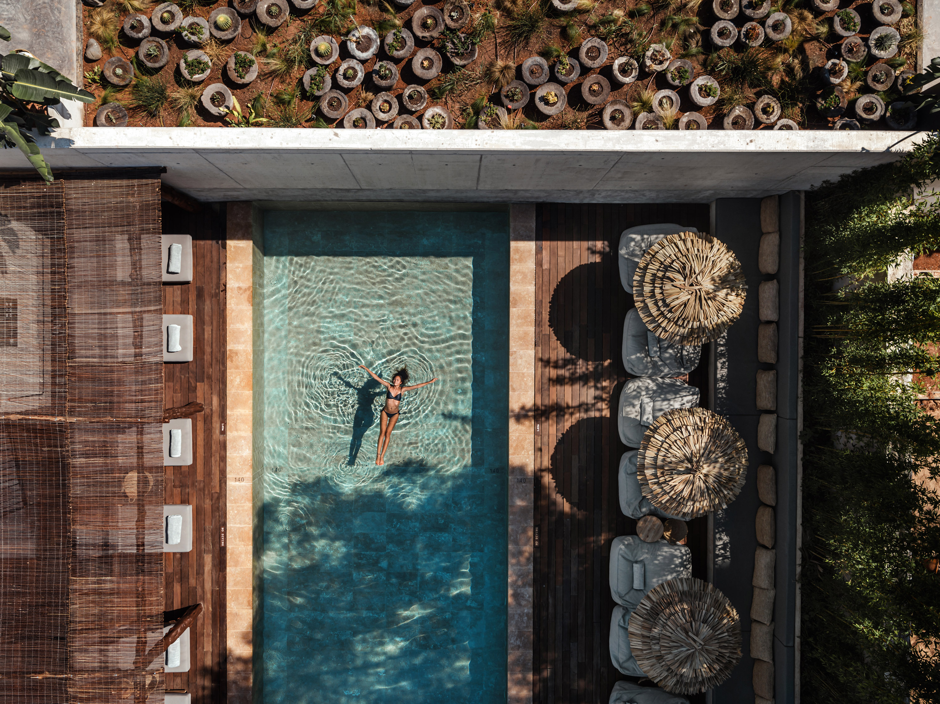 OKU Ibiza · OKU Ibiza five-star luxury hotel swimming pool relax poolside drinks cocktails