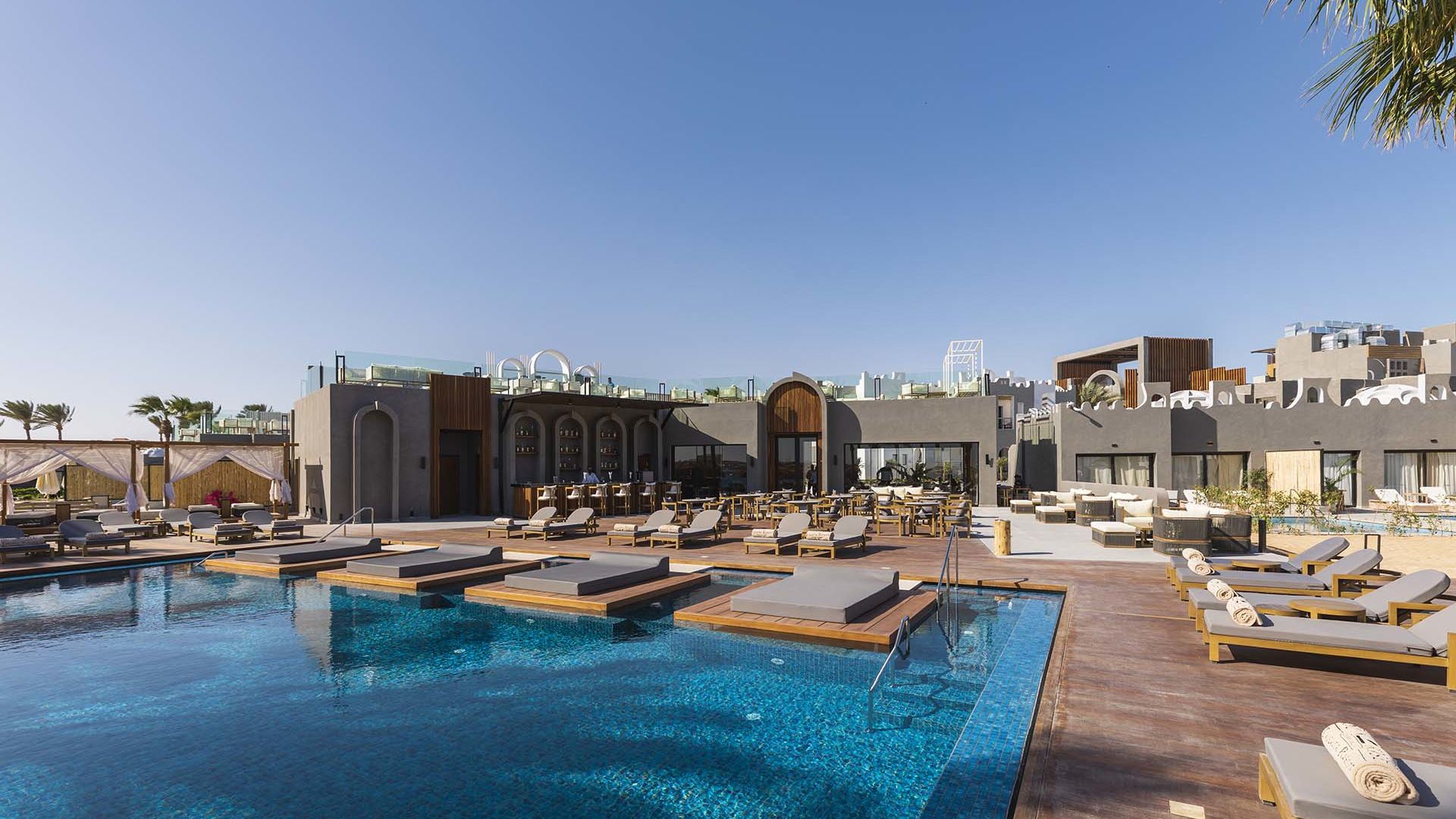 SUNRISE Tucana Resort · Grand Select · Tagesansicht mit Pool und Resortarchitektur
