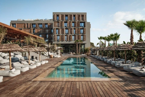 OKU Ibiza · OKU Ibiza five-star luxury hotel swimming pool DJ live music day passes relax