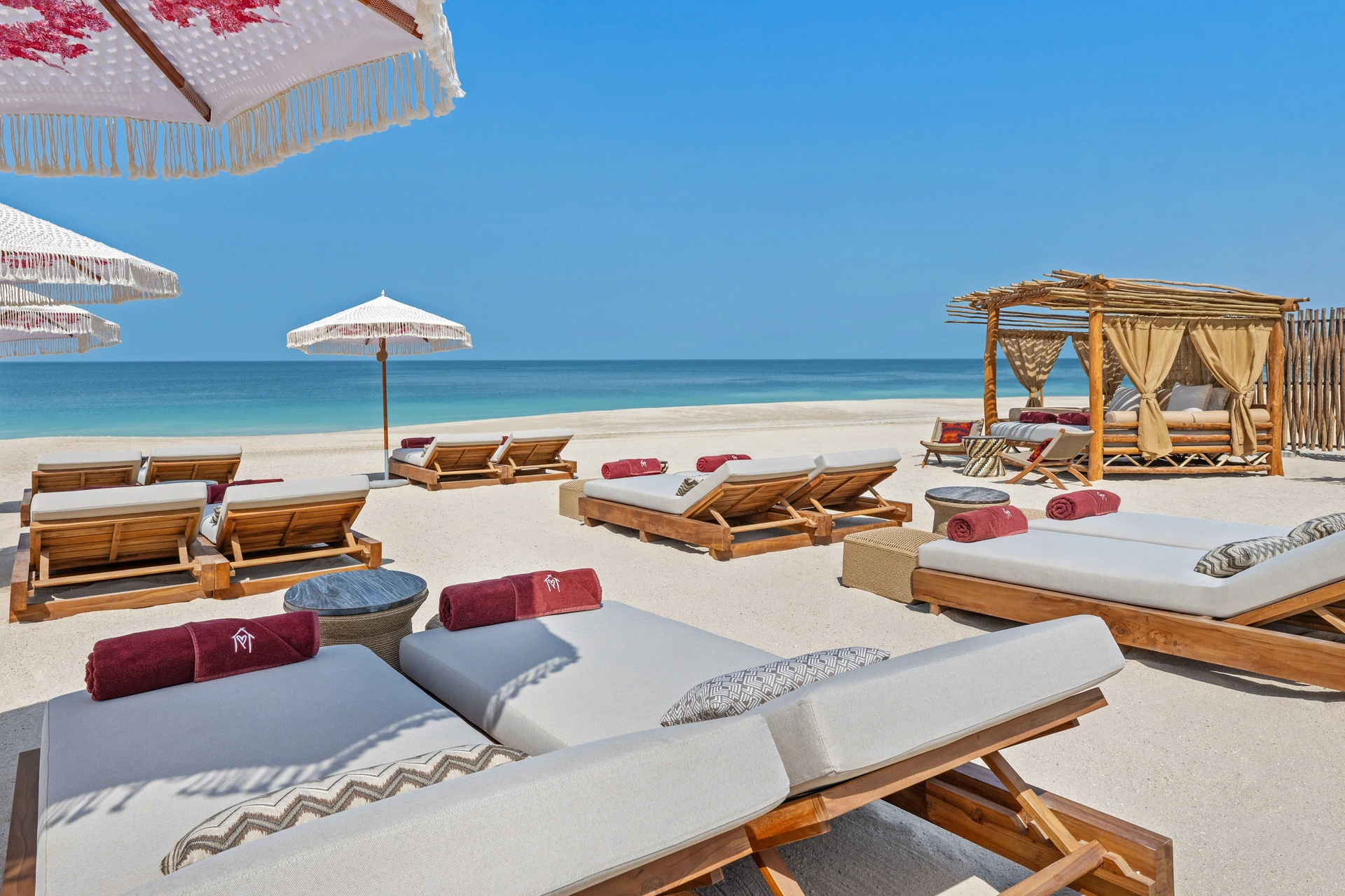 Mandarin Oriental Jumeira, Dubai · Sunbeds on the beach at Casita by Casa Amor at Mandarin Oriental, Dubai